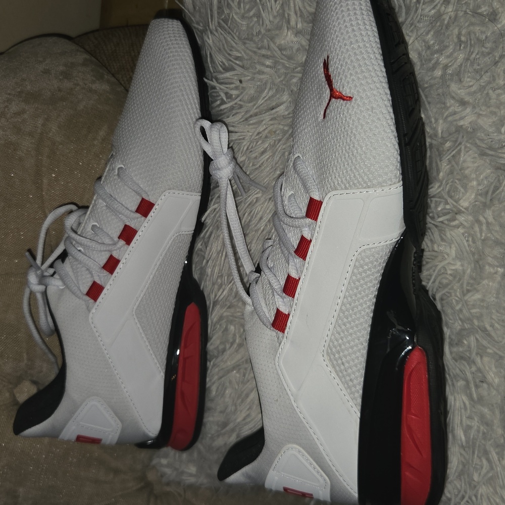 Puma Men's White and Black Athletic Shoes with Red Accents